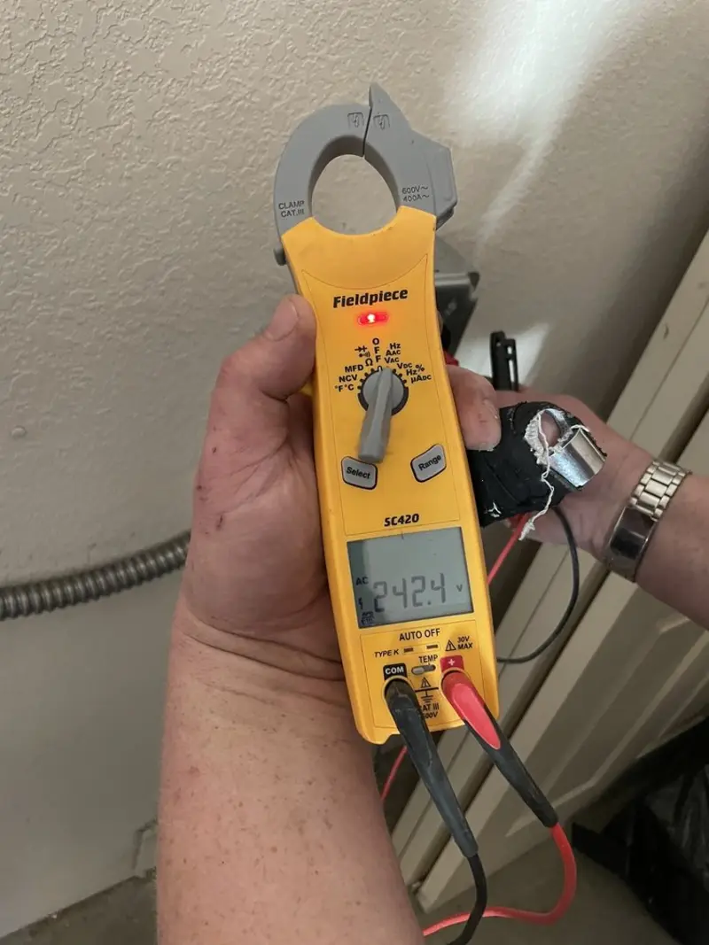Voltage testing with clamp meter during Electrical Installation Services in Daly City